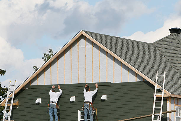 Professional Siding Installation technician working in Berryville, VA